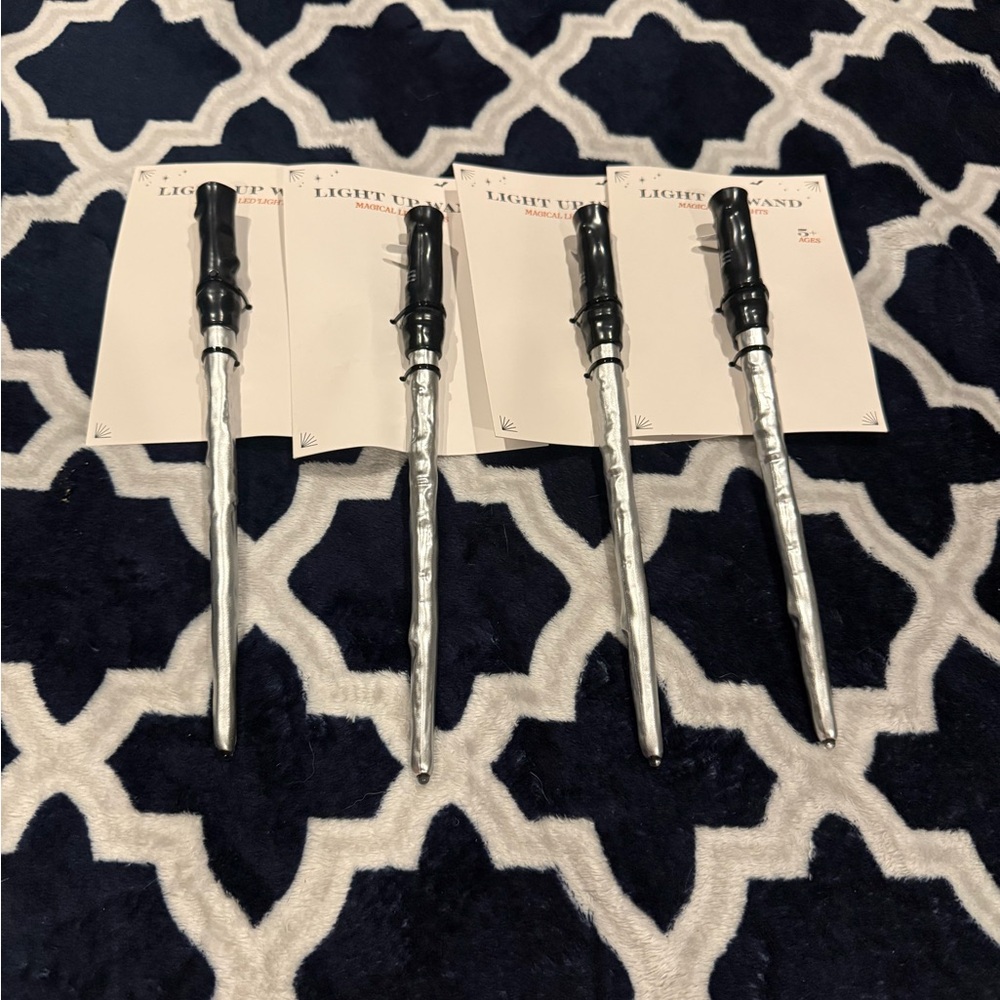 FOUR NEW Black light up wand